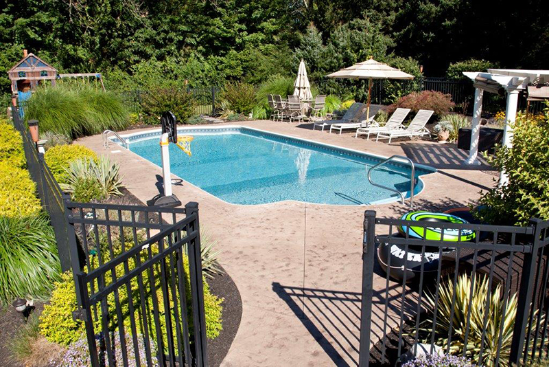 Swimming pool and stamped concrete project example 19